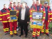 Übergabe von Notfallkoffern an die DLRG in Langenau